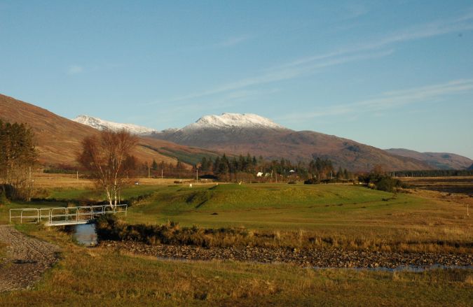 This photo shows a view across Lochcarron golf course with the distinctive shape of "Wellington" in the background and was taken on a superb winter's day just a week before Christmas.